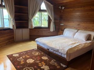Letto o letti in una camera di Yun Meng Xianjing Homestay