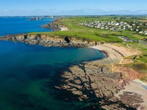 an aerial view of the cliffs next to the ocean at Ocean View Apartment in Thurlestone