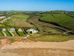 an aerial view of a village and a river at Ocean View Apartment in Thurlestone