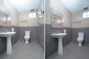 een badkamer met 2 toiletten, een wastafel en een douche bij Super OYO 90009 Bangi Sri Minang Guesthouse in Bangi