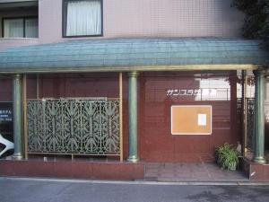 a building with a gate on the side of it at Sunplaza Rinkai in Osaka