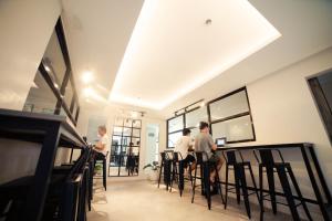 TV a/nebo společenská místnost v ubytování Seeya Hotel