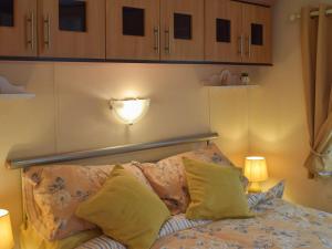 Tranquillity Lodge tesisinde bir odada yatak veya yataklar