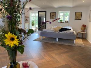 Postel nebo postele na pokoji v ubytování Guldforhoved B&B