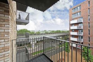 a view from a balcony of a building at London Dockside Apartment in London