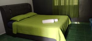 Postel nebo postele na pokoji v ubytování Durian Chalet
