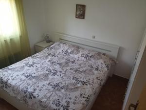 Postel nebo postele na pokoji v ubytování Apartments Miletic J-I