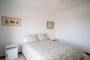 A bed or beds in a room at Casa Hortensia. Barbacoa en Robledo de Chavela
