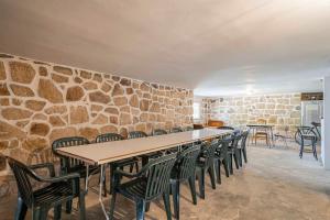 A restaurant or other place to eat at Casa Hortensia. Barbacoa en Robledo de Chavela