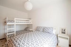 A bed or beds in a room at Casa Hortensia. Barbacoa en Robledo de Chavela