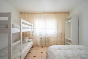A bed or beds in a room at Casa Hortensia. Barbacoa en Robledo de Chavela
