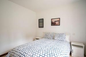 A bed or beds in a room at Casa Hortensia. Barbacoa en Robledo de Chavela