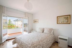 A bed or beds in a room at Casa Hortensia. Barbacoa en Robledo de Chavela