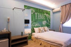 Postel nebo postele na pokoji v ubytování Bei Pin B&B