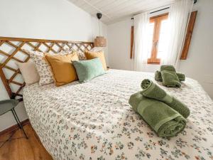 Postel nebo postele na pokoji v ubytování Casa La Buganvilla