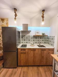 Kuchyň nebo kuchyňský kout v ubytování Casa La Buganvilla