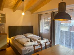 Llit o llits en una habitació de Tuxie Haus