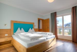 Postel nebo postele na pokoji v ubytování Pension Runer + 37 fotografií