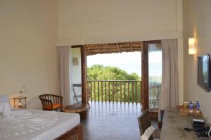 Rõdu või terrass majutusasutuses Giman Free Beach Resort