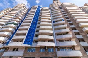 エレバンにあるStay Inn Apartments near Dalma Garden Mallの高層マンション2棟の写真