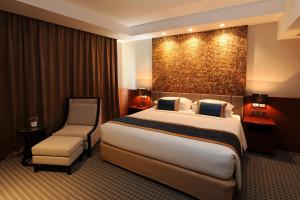 Katil atau katil-katil dalam bilik di Yangon Thanlwin Hotel