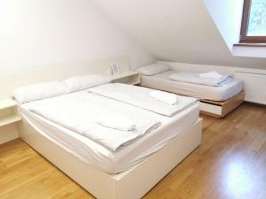 Postel nebo postele na pokoji v ubytování Rooms Sincere 1830