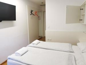 Postel nebo postele na pokoji v ubytování Rooms Sincere 1830