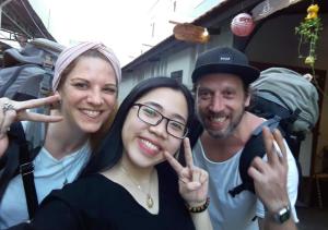 a group of three people posing for a picture at Gikgo Can Tho in Can Tho