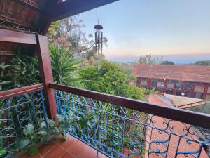 a balcony with a view of a building at וילה תהילה המחודש - The new Villa Tehila in Rosh Pinna