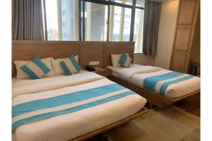 A bed or beds in a room at Hotel Tapas