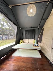 Ліжко або ліжка в номері YCC Forest Campsite