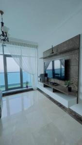TV a/nebo společenská místnost v ubytování Luxury-Home Amazing sea view