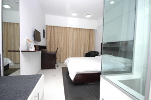 Postel nebo postele na pokoji v ubytování Keys Select by Lemon Tree Hotels, Ludhiana + 15 fotografií
