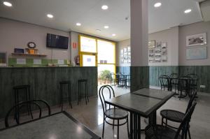 TV a/nebo společenská místnost v ubytování Hotel Blauet by Bossh! Hotels