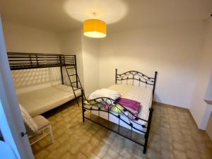 Postel nebo postele na pokoji v ubytování Logement individuel circuit 24h du Mans ou autre