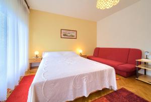 Postel nebo postele na pokoji v ubytování Apartment Ljerka
