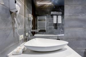 Vannituba majutusasutuses AuRoom Bakuriani Resort