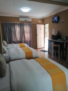 Fotografie z fotogalerie ubytování Rondy Bosch Lodge v destinaci Louis Trichardt + 50 fotografií