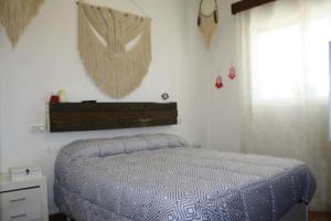 Un ou plusieurs lits dans un hébergement de l'établissement Preciosa villa con Piscina cerca de Sevilla