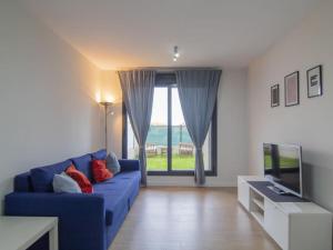 Μια τηλεόραση ή/και κέντρο ψυχαγωγίας στο Apartamento Holidea Playa San Juan de la Canal +3 φωτογραφίες