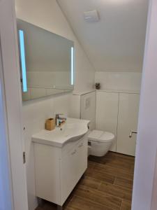 Kúpeľňa v ubytovaní Apartments Jungic, Rab