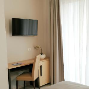 TV a/nebo společenská místnost v ubytování Hotel Boston