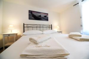 Letto o letti in una camera di Borgo Diaz