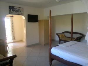 Ein Bett oder Betten in einem Zimmer der Unterkunft Glory Holiday Resort