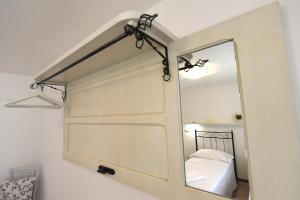 Letto o letti in una camera di Borgo Diaz