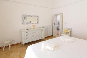 Letto o letti in una camera di Borgo Diaz