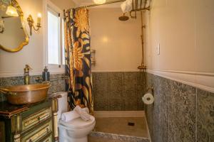a bathroom with a sink and a toilet and a shower at Casa Ancladero Room W big balcony and lovely view in Fuengirola +32 photos