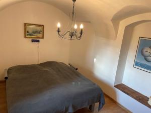 Postel nebo postele na pokoji v ubytování Hlinné v Orlických horách