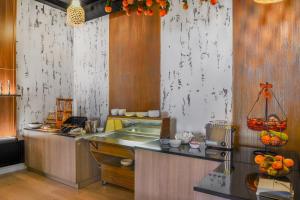 Neuchâtel City Hôtel 주방 또는 간이 주방