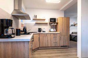 Cuisine ou kitchenette dans l'établissement Küsters Ferienhaus Tinchen